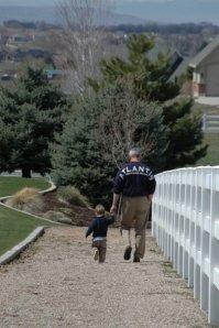 My Uncle Lew walking with his grandson.